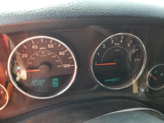 1C4HJWEG9CL121279 - 2012 JEEP WRANGLER U SAHARA RED photo 9