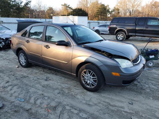 1FAFP34N37W250035 - 2007 FORD FOCUS ZX4 GRAY photo 4