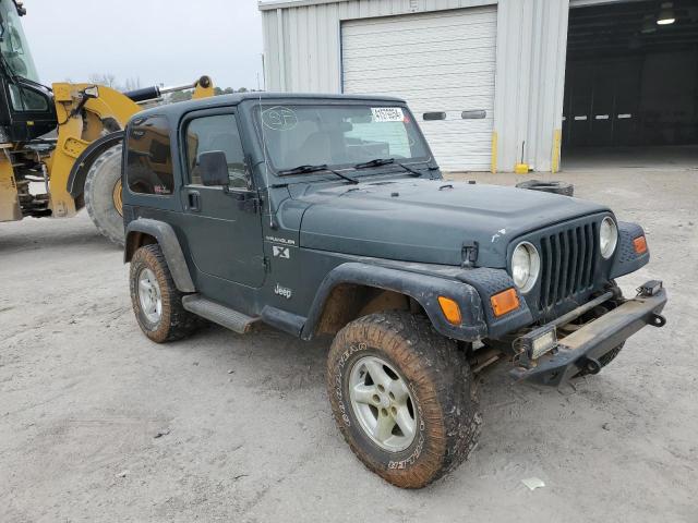 1J4FA39S72P754627 - 2002 JEEP WRANGLER / X GREEN photo 4