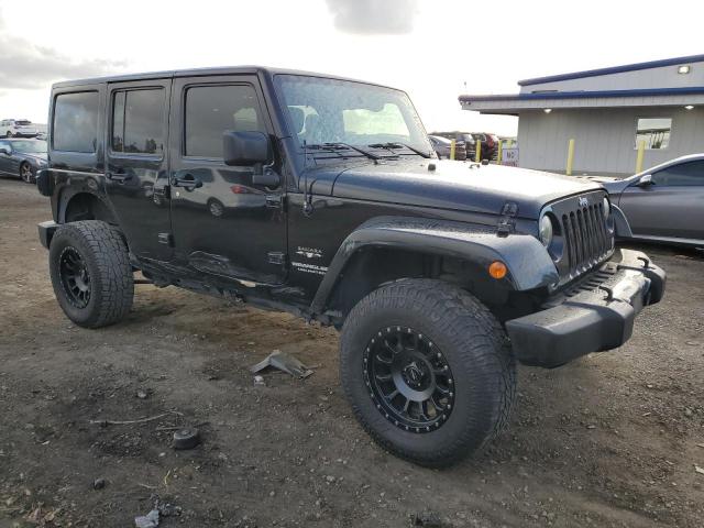 1C4HJWEG3GL229970 - 2016 JEEP WRANGLER U SAHARA BLACK photo 4
