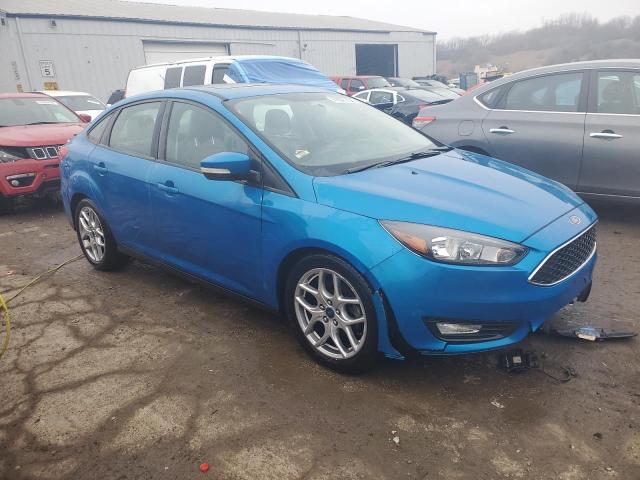 1FADP3F29FL277279 - 2015 FORD FOCUS SE BLUE photo 4