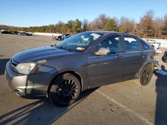 1FAHP3GN8AW135779 - 2010 FORD FOCUS SES GRAY photo 1
