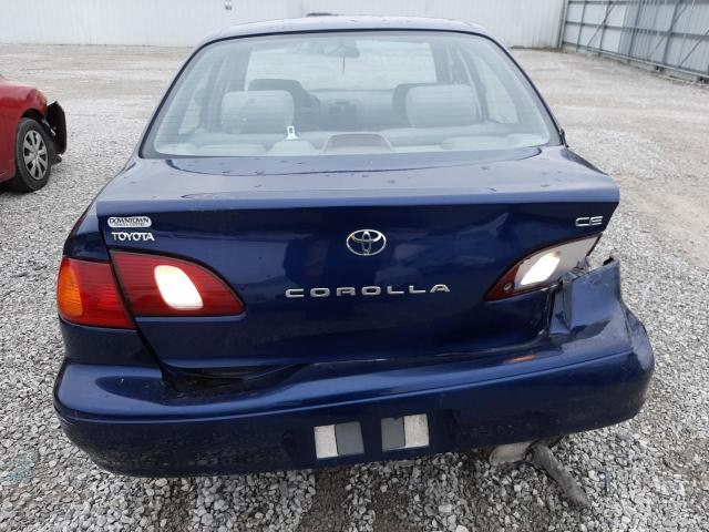 2T1BR12E5WC729915 - 1998 TOYOTA COROLLA VE BLUE photo 6