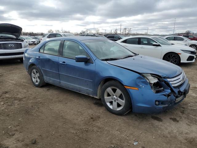 3FAHP07149R189509 - 2009 FORD FUSION SE BLUE photo 4