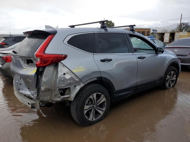 2HKRW6H37JH232414 - 2018 HONDA CR-V LX SILVER photo 3