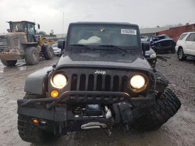 1C4BJWDG3CL101455 - 2012 JEEP WRANGLER U SPORT შავი ფოტო 5