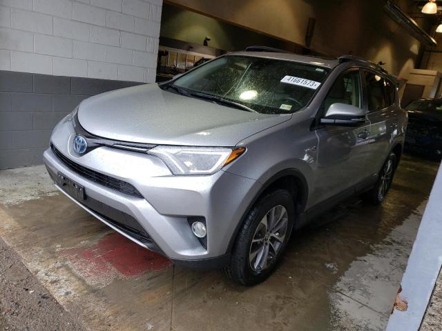 JTMRJREVXJD254788 - 2018 TOYOTA RAV4 HV LE SILVER photo 1