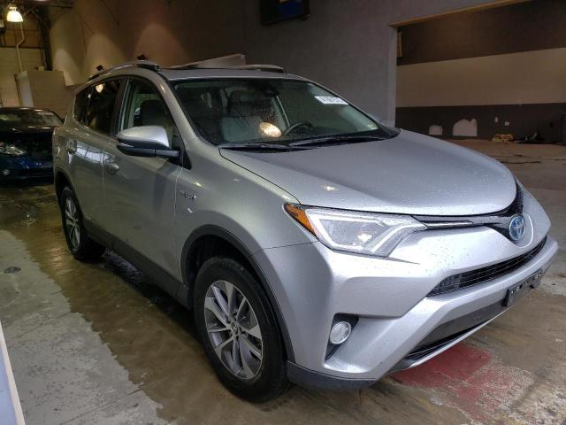 JTMRJREVXJD254788 - 2018 TOYOTA RAV4 HV LE SILVER photo 4