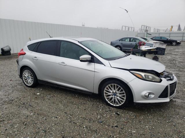 1FAHP3M26CL206783 - 2012 FORD FOCUS SEL SILVER photo 4