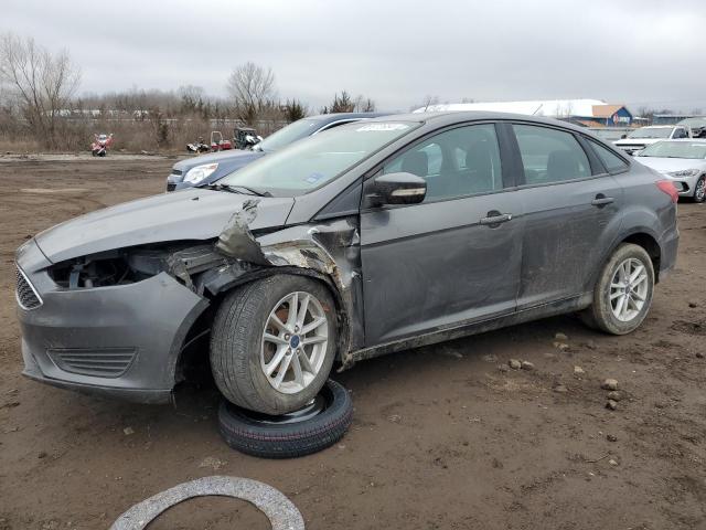 1FADP3F24JL239452 - 2018 FORD FOCUS SE CHARCOAL photo 1