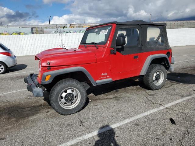 1J4FA291X3P331320 - 2003 JEEP WRANGLER / SE RED photo 1