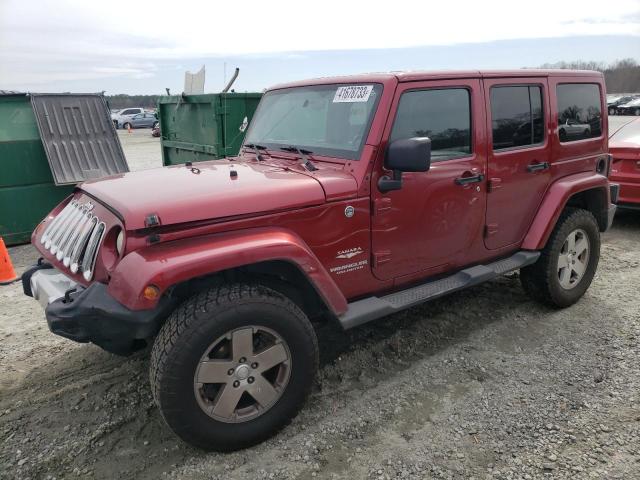 1J4HA5H14BL532017 - 2011 JEEP WRANGLER U SAHARA BURGUNDY photo 1