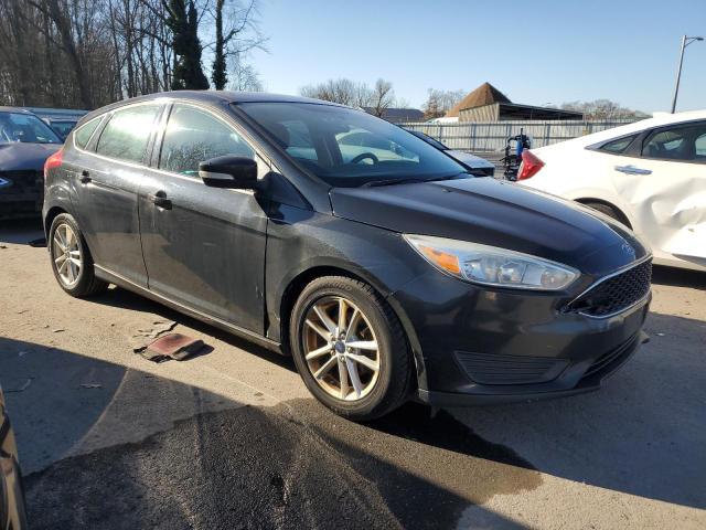 1FADP3K29FL283332 - 2015 FORD FOCUS SE BLACK photo 4