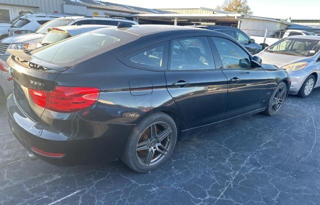 WBA3X9C5XED153633 - 2014 BMW 335 XIGT BLACK photo 4