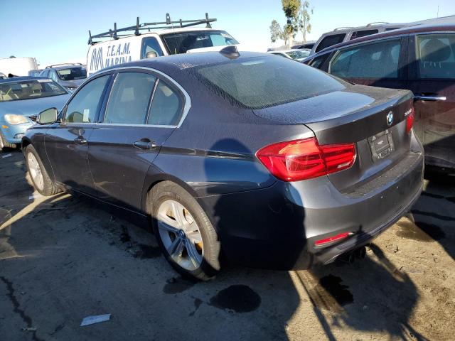 WBA8B9C54JEE82680 - 2018 BMW 330 I GRAY photo 2