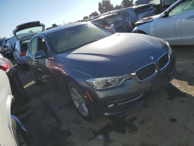 WBA8B9C54JEE82680 - 2018 BMW 330 I GRAY photo 4