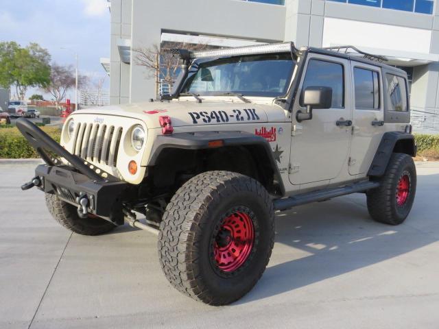 1J4BA3H17BL570657 - 2011 JEEP WRANGLER U SPORT თაფლისფერი ფოტო 1