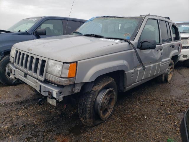1J4GZ78Y2WC247903 - 1998 JEEP GRAND CHER LIMITED SILVER photo 1