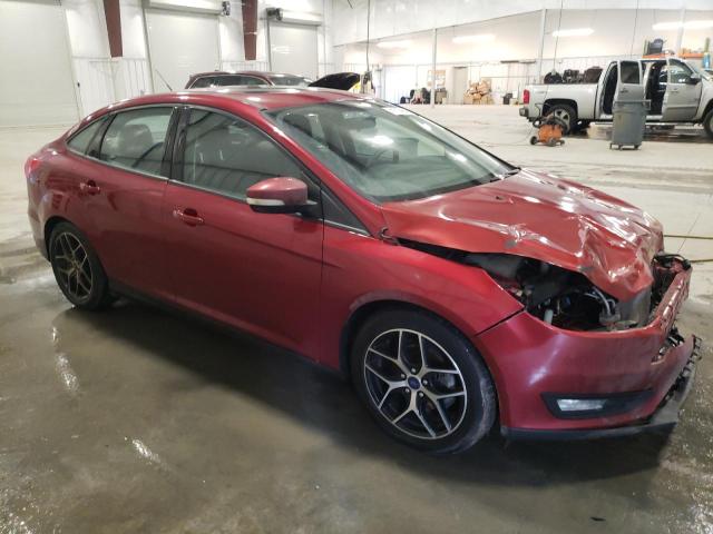 1FADP3H25HL258325 - 2017 FORD FOCUS SEL RED photo 4