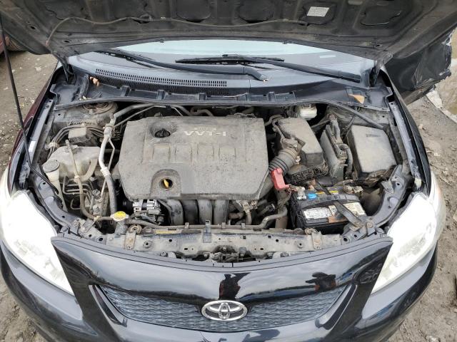 1NXBU4EE1AZ297150 - 2010 TOYOTA COROLLA BASE BLACK photo 11