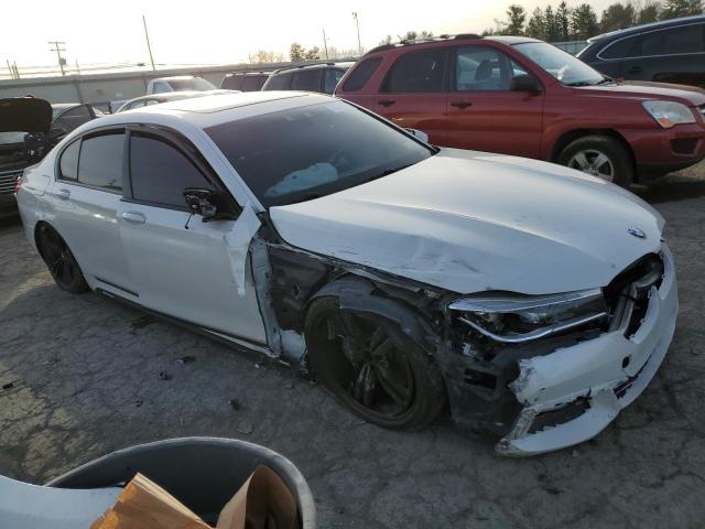 WBA7F2C54GG421024 - 2016 BMW 750 XI WHITE photo 4