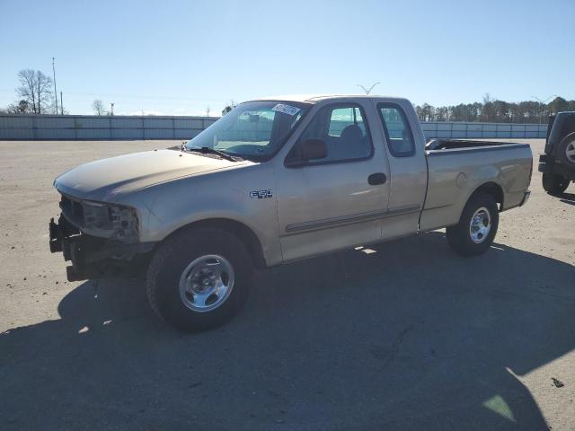 1FTZX1722YNA67049 - 2000 FORD F150 GOLD photo 1