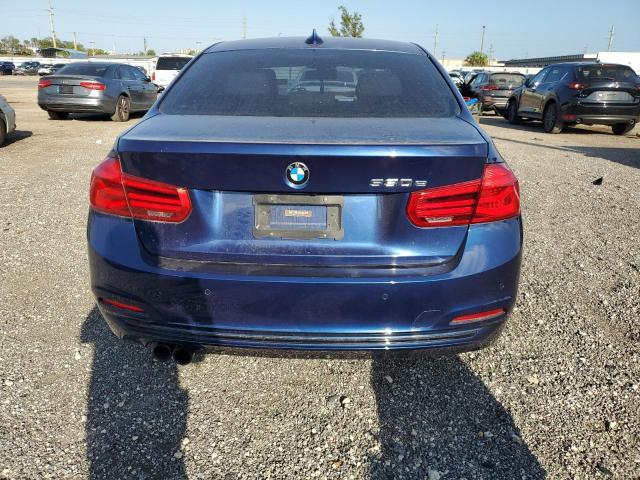 WBA8E1C37HA156815 - 2017 BMW 330E BLUE photo 6