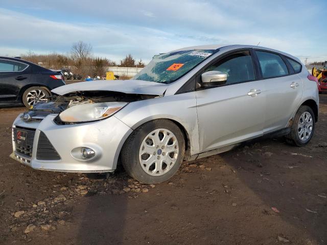 1FAHP3K29CL448423 - 2012 FORD FOCUS SE SILVER photo 1