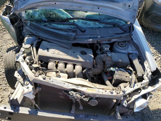 2T1KR32E77C684909 - 2007 TOYOTA COROLLA MA XR SILVER photo 7