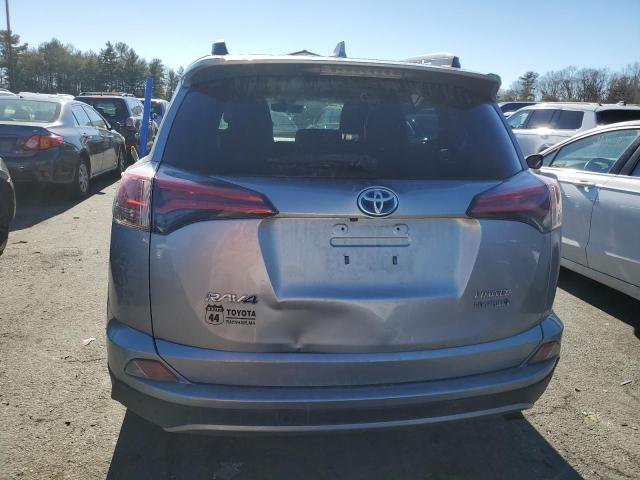 JTMDJREV7JD165237 - 2018 TOYOTA RAV4 HV LIMITED SILVER photo 6