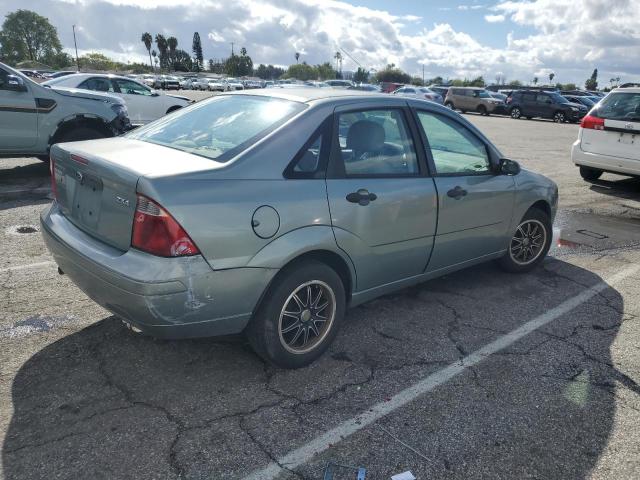 1FAHP34N06W176662 - 2006 FORD FOCUS ZX4 GRAY photo 3