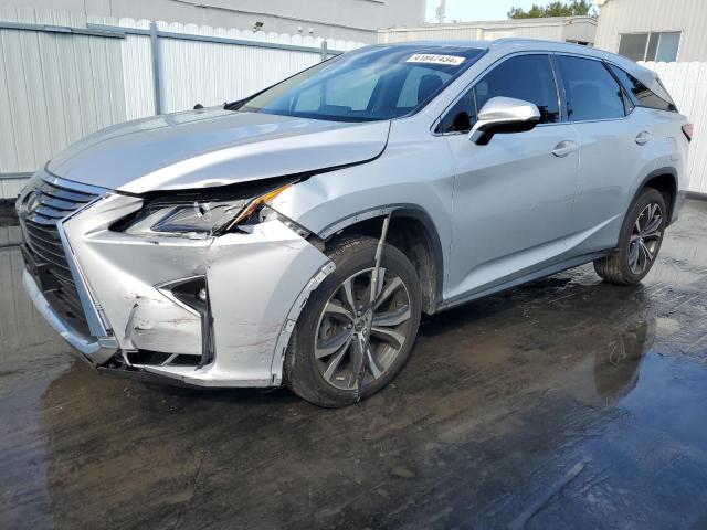 JTJDZKCA1K2016722 - 2019 LEXUS RX 350 L SILVER photo 1