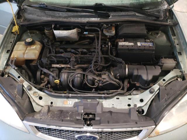 1FAFP34N95W248965 - 2005 FORD FOCUS ZX4 GREEN photo 11