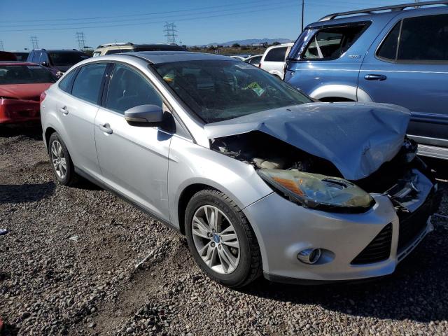 1FAHP3H25CL183894 - 2012 FORD FOCUS SEL SILVER photo 4