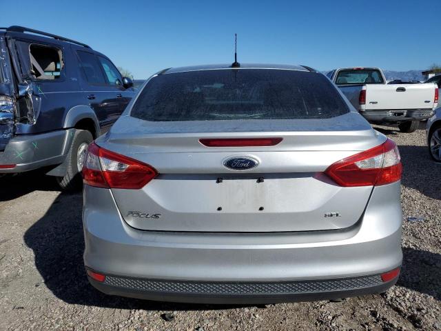 1FAHP3H25CL183894 - 2012 FORD FOCUS SEL SILVER photo 6