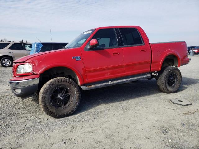 1FTRW08LX1KA22856 - 2001 FORD F150 SUPERCREW RED photo 1