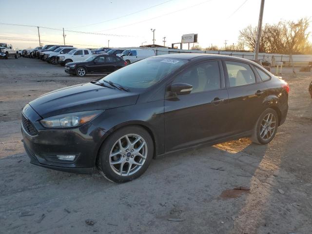 1FADP3F24FL235229 - 2015 FORD FOCUS SE BLACK photo 1