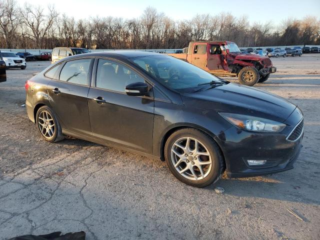 1FADP3F24FL235229 - 2015 FORD FOCUS SE BLACK photo 4