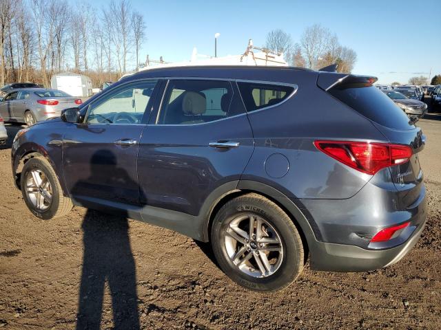 5NMZUDLB0HH032670 - 2017 HYUNDAI SANTA FE S GRAY photo 2