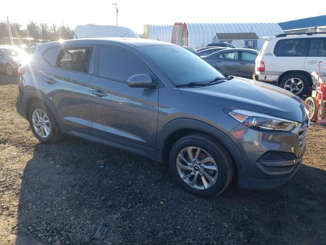 KM8J2CA47JU680647 - 2018 HYUNDAI TUCSON SE GRAY photo 4