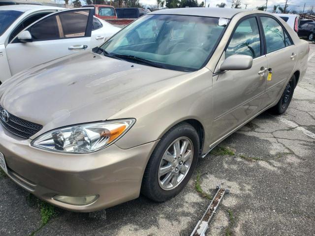 JTDBE32K430155066 - 2003 TOYOTA CAMRY LE GOLD photo 2