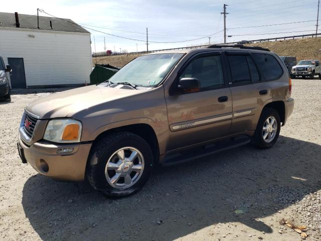 1GKDT13SX32167300 - 2003 GMC ENVOY TAN photo 1