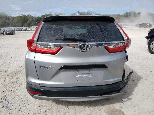 2HKRW5H39JH421933 - 2018 HONDA CR-V LX SILVER photo 6