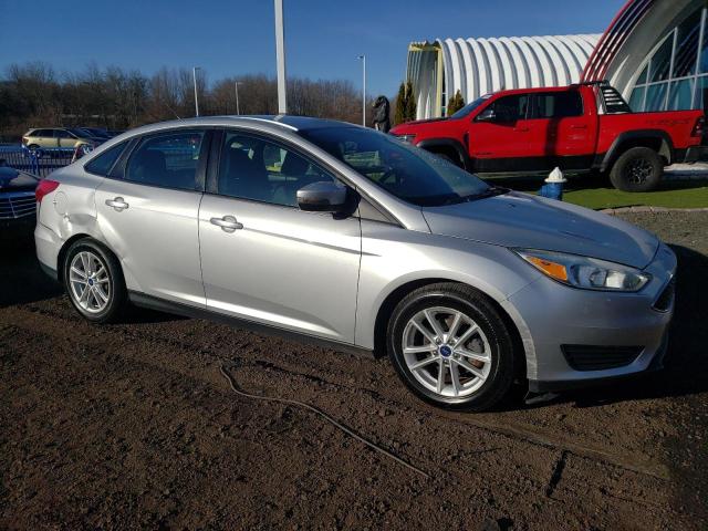 1FADP3F20FL329365 - 2015 FORD FOCUS SE SILVER photo 4