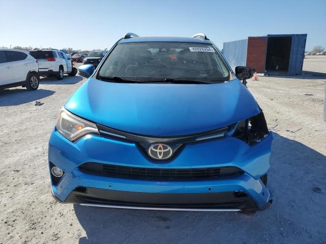 JTMYFREV9GJ069929 - 2016 TOYOTA RAV4 LIMITED BLUE photo 5