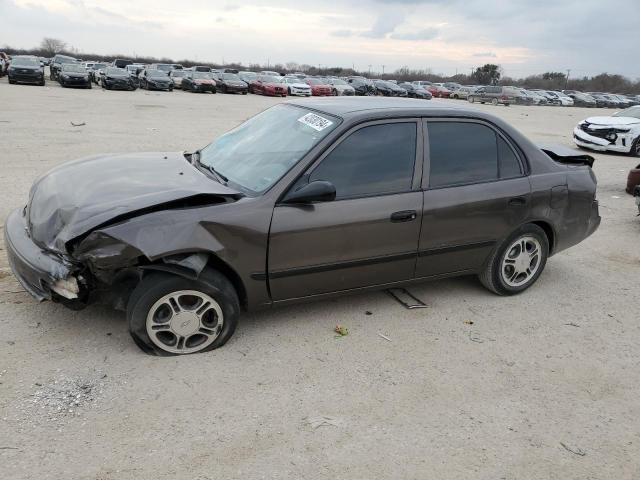 1Y1SK5284YZ407695 - 2000 CHEVROLET GEO PRIZM BASE GRAY photo 1