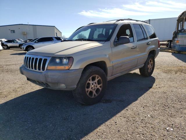 1J4GW58S6XC594743 - 1999 JEEP GRAND CHER LAREDO TAN photo 1