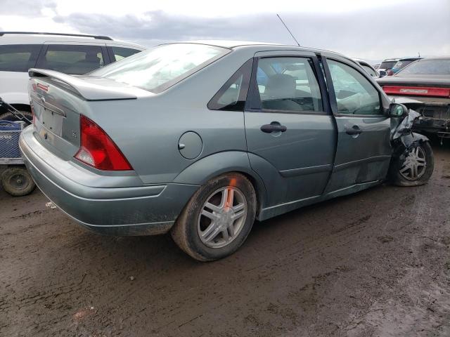 1FAFP34P43W199883 - 2003 FORD FOCUS SE TURQUOISE photo 3