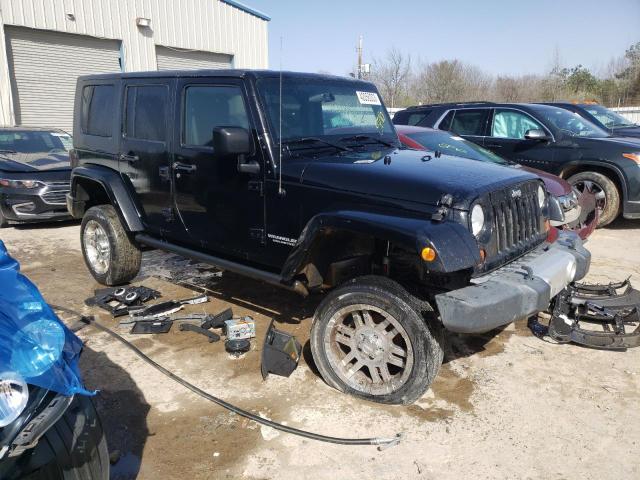 1J4HB5H18AL139388 - 2010 JEEP WRANGLER U SAHARA BLACK photo 4