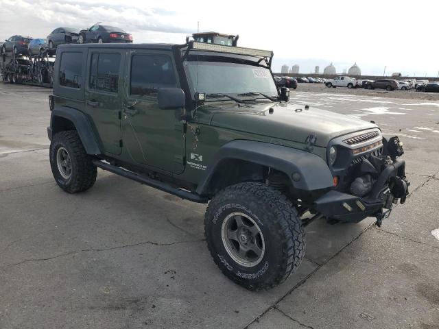 1J4GA39119L714363 - 2009 JEEP WRANGLER U X GREEN photo 4